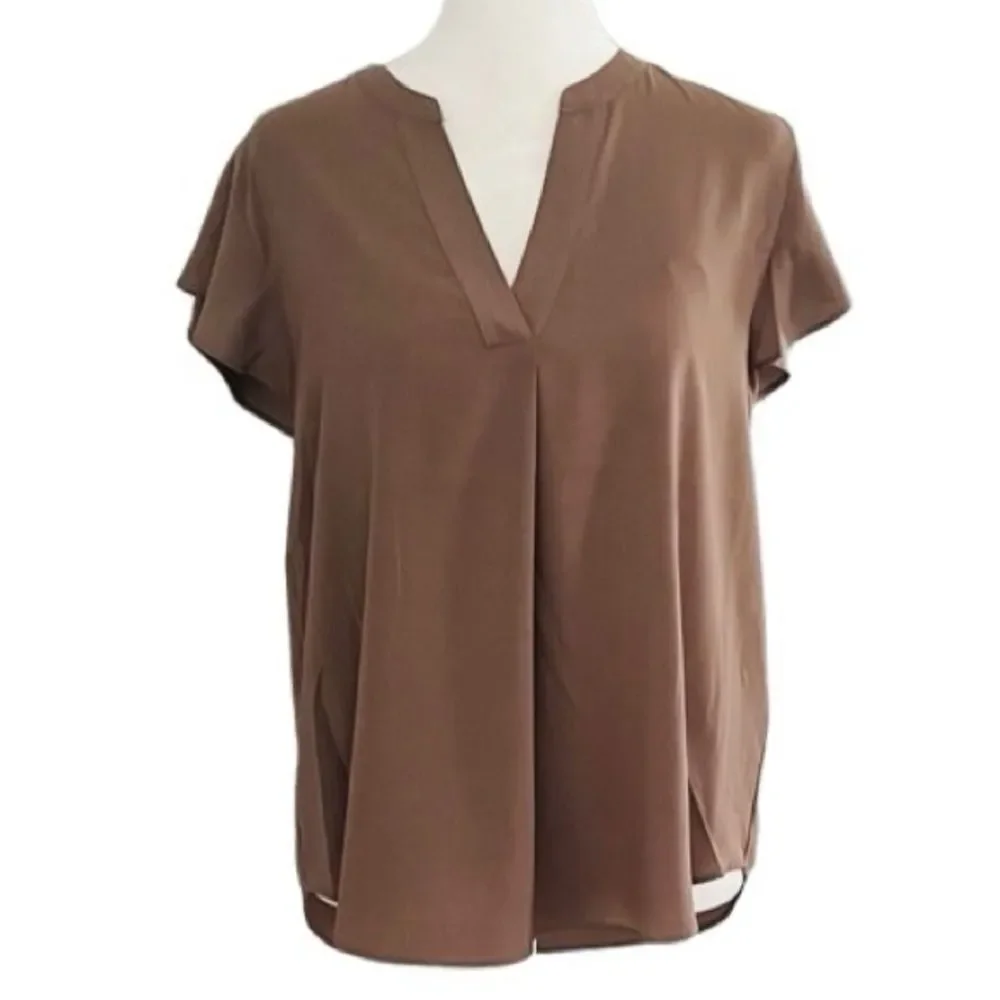 New with tags Calvin Klein split neck flutter sleeve blouse size M.